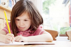 landscape-1439477408-girl-doing-homework